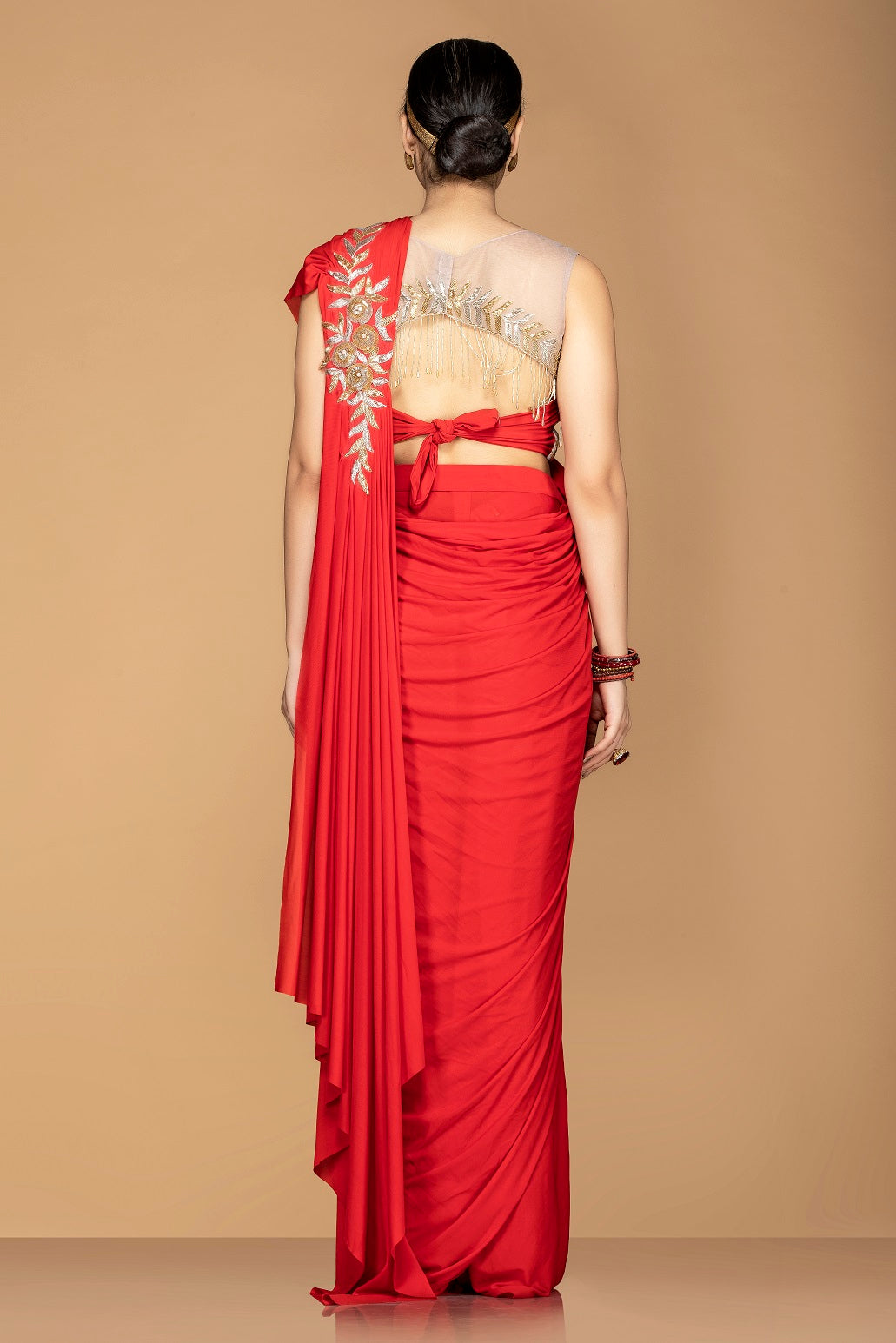 Shop gorgeous red embroidered designer saree online in USA with embroidered saree blouse. Champion ethnic fashion with a splendid collection of designer sarees, embroidered sarees with blouse, weddings saris from Pure Elegance Indian fashion store in USA.-back