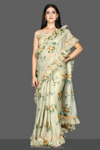 Buy gorgeous pista green floral organza silk saree online in USA with off-shoulder blouse. Go for an attractive saree style with Pure Elegance designer sarees. embroidered sarees, pure silk saris available at our exclusive Indian fashion store in USA.-full view