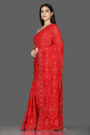 Shop ravishing red Lucknowi georgette sari online in USA with embroidered saree blouse. Shine at weddings and special occasions with beautiful embroidered sarees, designer sari with blouse in USA from Pure Elegance Indian clothing in USA.-side