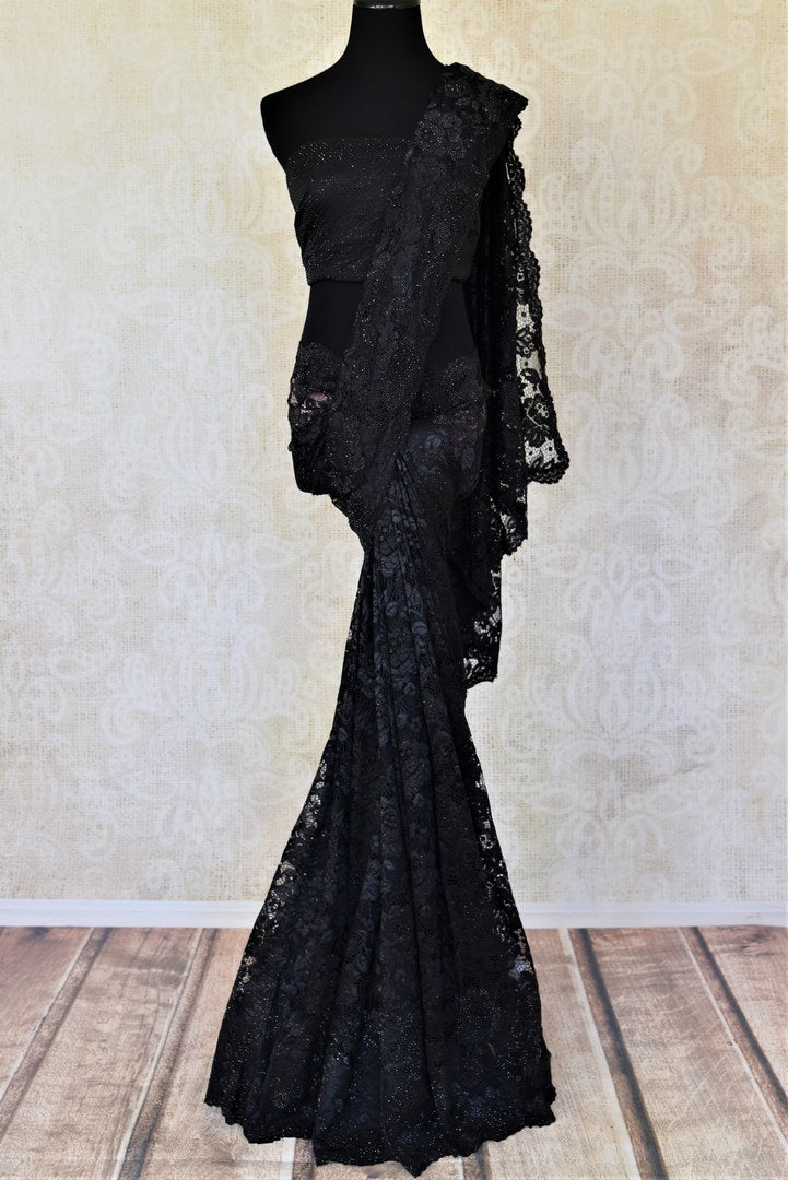 Shop stunning black stone work designer sari online in USA. Make a glamorous appearance on special occasions with exquisite Indian designer sarees, embroidered saris, Bollywood sarees from Pure Elegance Indian fashion store in USA.-full view