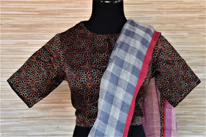Buy grey check linen saree online in USA with Ajrak saree blouse. Go for a distinct and tasteful saree style on special occasions with handwoven sarees, linen sarees with blouse from Pure Elegance Indian fashion store in USA.-blouse pallu