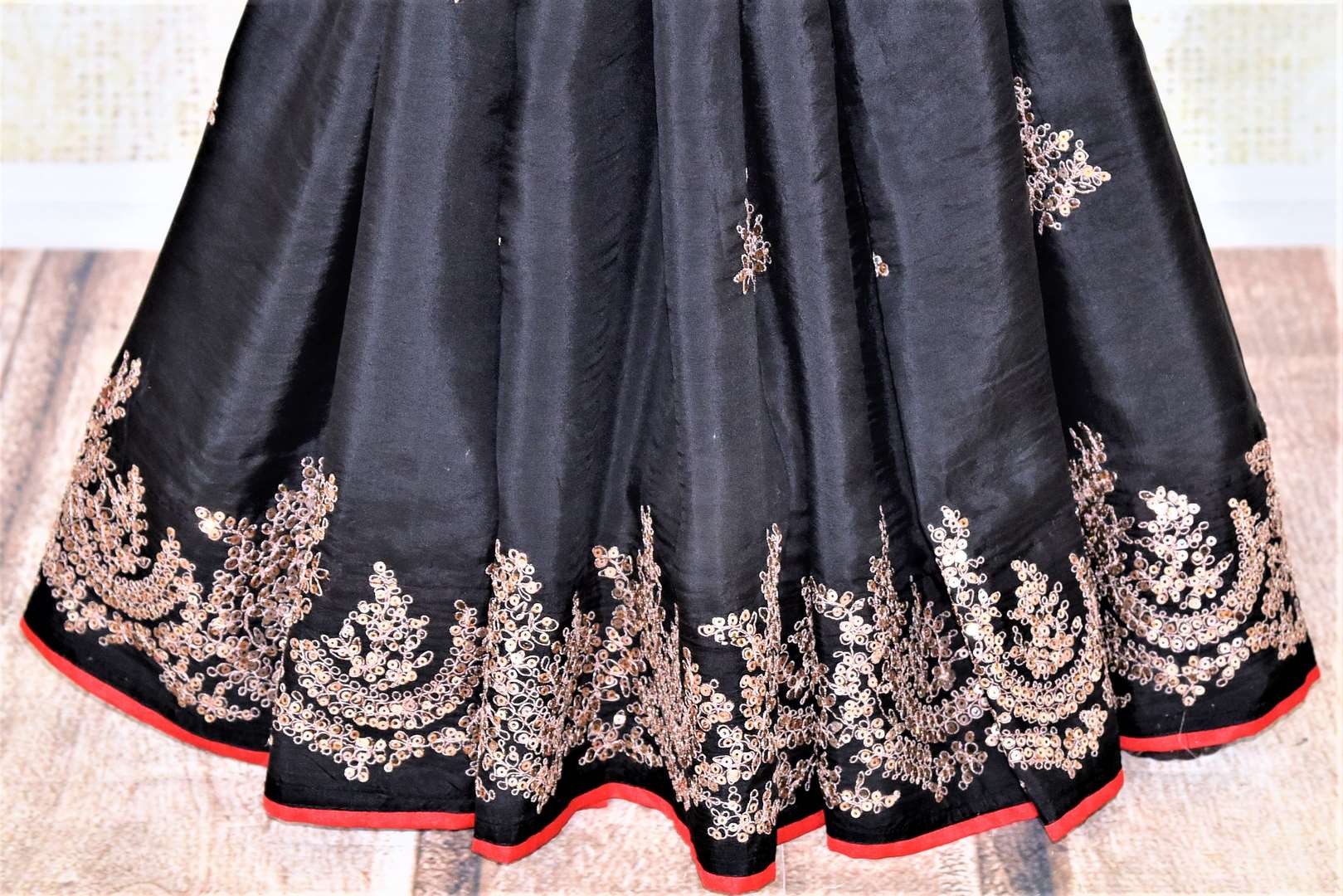 Shop stunning black silk saree online in USA with embroidered border. Be the center of attraction at weddings and parties with beautiful silk sarees, embroidered sarees, partywear sarees, fancy sarees from Pure Elegance Indian fashion store in USA. -pleats