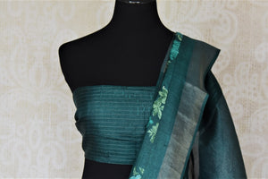 Shop beautiful sea green floral tussar saree online in USA with light zari border. Be the talk of the occasions in exquisite tassar sarees, embroidered saris from Pure Elegance Indian fashion store in USA. -blouse pallu
