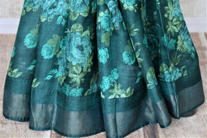 Shop beautiful sea green floral tussar saree online in USA with light zari border. Be the talk of the occasions in exquisite tassar sarees, embroidered saris from Pure Elegance Indian fashion store in USA. -pleats