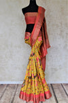 Shop charming yellow floral print tassar sari online in USA with pink zari border. Be the talk of the occasions in exquisite tassar sarees, handwoven silk saris from Pure Elegance Indian fashion store in USA. -full view