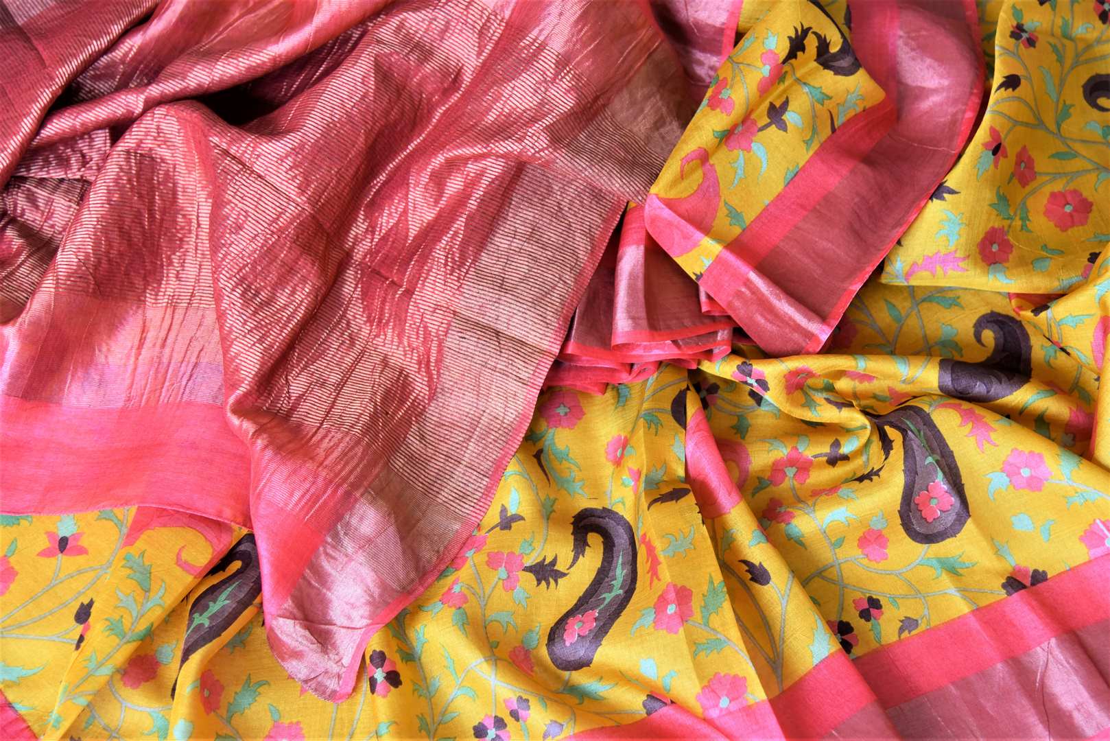 Shop charming yellow floral print tassar sari online in USA with pink zari border. Be the talk of the occasions in exquisite tassar sarees, handwoven silk saris from Pure Elegance Indian fashion store in USA. -details