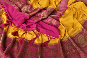 Shop bright yellow tussar Banarsi saree online in USA with pink antique zari border. Be the center of attraction at parties and weddings with beautiful Kanchipuram silk sarees, pure silk sarees, handwoven sarees, Banarasi sarees from Pure Elegance Indian fashion store in USA.-details