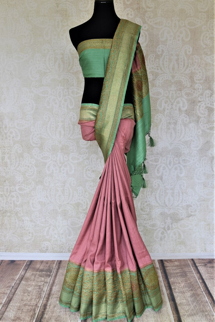 Shop beautiful mauve pink tussar Banarsi sari online in USA with green antique zari border. Be the center of attraction at parties and weddings with beautiful Kanchipuram silk sarees, pure silk sarees, handwoven sarees, Banarasi sarees from Pure Elegance Indian fashion store in USA.-full view