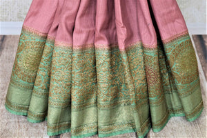 Shop beautiful mauve pink tussar Banarsi sari online in USA with green antique zari border. Be the center of attraction at parties and weddings with beautiful Kanchipuram silk sarees, pure silk sarees, handwoven sarees, Banarasi sarees from Pure Elegance Indian fashion store in USA.-pleats