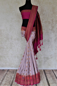 Buy lavender muga Banarasi sari online in USA with pink antique zari floral border. Keep your ethnic style updated with latest designer sarees, handloom sarees, pure silk sarees from Pure Elegance Indian fashion store in USA.-full view