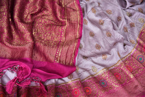 Buy lavender muga Banarasi sari online in USA with pink antique zari floral border. Keep your ethnic style updated with latest designer sarees, handloom sarees, pure silk sarees from Pure Elegance Indian fashion store in USA.-details