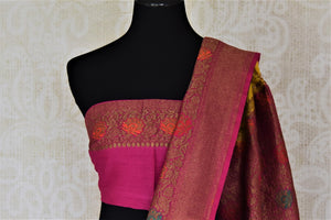Buy yellow muga Benarasi saree online in USA with pink antique zari floral border. Keep your ethnic style updated with latest designer sarees, handloom sarees, muga silk sarees from Pure Elegance Indian fashion store in USA.-blouse pallu