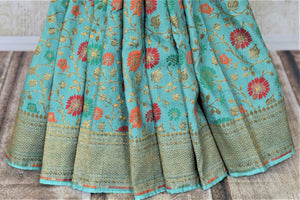 Buy stunning sea green minakari weave Banarasi saree online in USA. Keep it light yet festive on special occasions with beautiful handwoven saris, Banarasi sarees from Pure Elegance Indian fashion store in USA.-pleats
