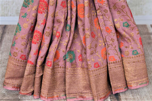 Shop beautiful blush pink minakari weave Banarasi saree online in USA with zari work. Keep it light yet festive on special occasions with beautiful handwoven saris, Banarasi sarees from Pure Elegance Indian fashion store in USA.-pleats