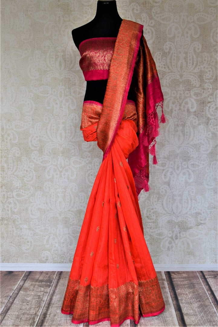 Buy bright red tussar Banarasi saree online in USA with zari buta and zari border. Choose tasteful handloom saris for special occasions from Pure Elegance. Our exclusive Indian fashion store has a myriad of exquisite pure silk saris, tussar sarees, Banarasi sarees for Indian women in USA.-full view