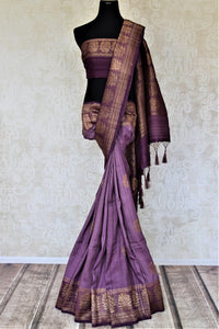 Shop beautiful purple tussar Benarasi saree online in USA with floral zari buta border. Be the center of attraction at parties and weddings with beautiful Banarasi silk sarees, pure silk sarees, handwoven sarees, Banarasi saris from Pure Elegance Indian fashion store in USA.-full view