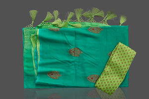 Shop alluring ombre green borderless muga Banarasi saree online in USA with antique zari buta. Shop beautiful Banarasi sarees, pure muga silk sarees in USA from Pure Elegance Indian fashion boutique in USA. Get spoiled for choices with a splendid variety of Indian saris to choose from! Shop now.-details