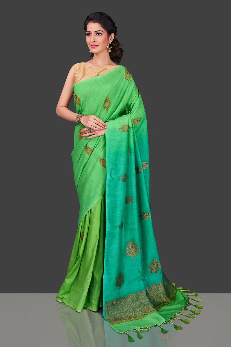 Shop alluring ombre green borderless muga Banarasi saree online in USA with antique zari buta. Shop beautiful Banarasi sarees, pure muga silk sarees in USA from Pure Elegance Indian fashion boutique in USA. Get spoiled for choices with a splendid variety of Indian saris to choose from! Shop now.-full view