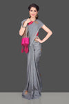 Shop lovely grey borderless muga Banarasi sari online in USA with antique zari buta. Shop beautiful Banarasi sarees, georgette sarees, pure muga silk sarees in USA from Pure Elegance Indian fashion boutique in USA. Get spoiled for choices with a splendid variety of Indian saris to choose from! Shop now.-full view