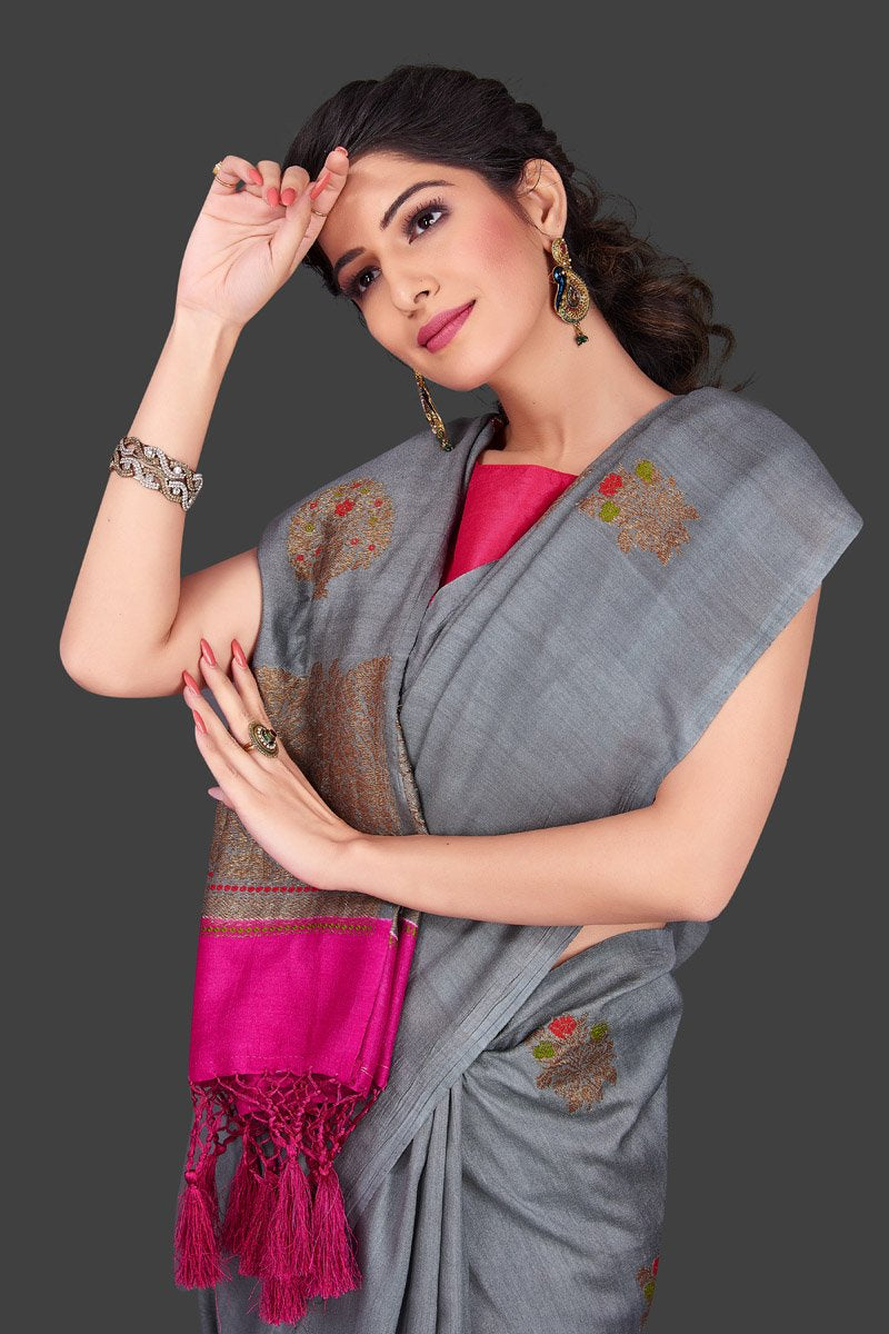 Shop lovely grey borderless muga Banarasi sari online in USA with antique zari buta. Shop beautiful Banarasi sarees, georgette sarees, pure muga silk sarees in USA from Pure Elegance Indian fashion boutique in USA. Get spoiled for choices with a splendid variety of Indian saris to choose from! Shop now.-closeup