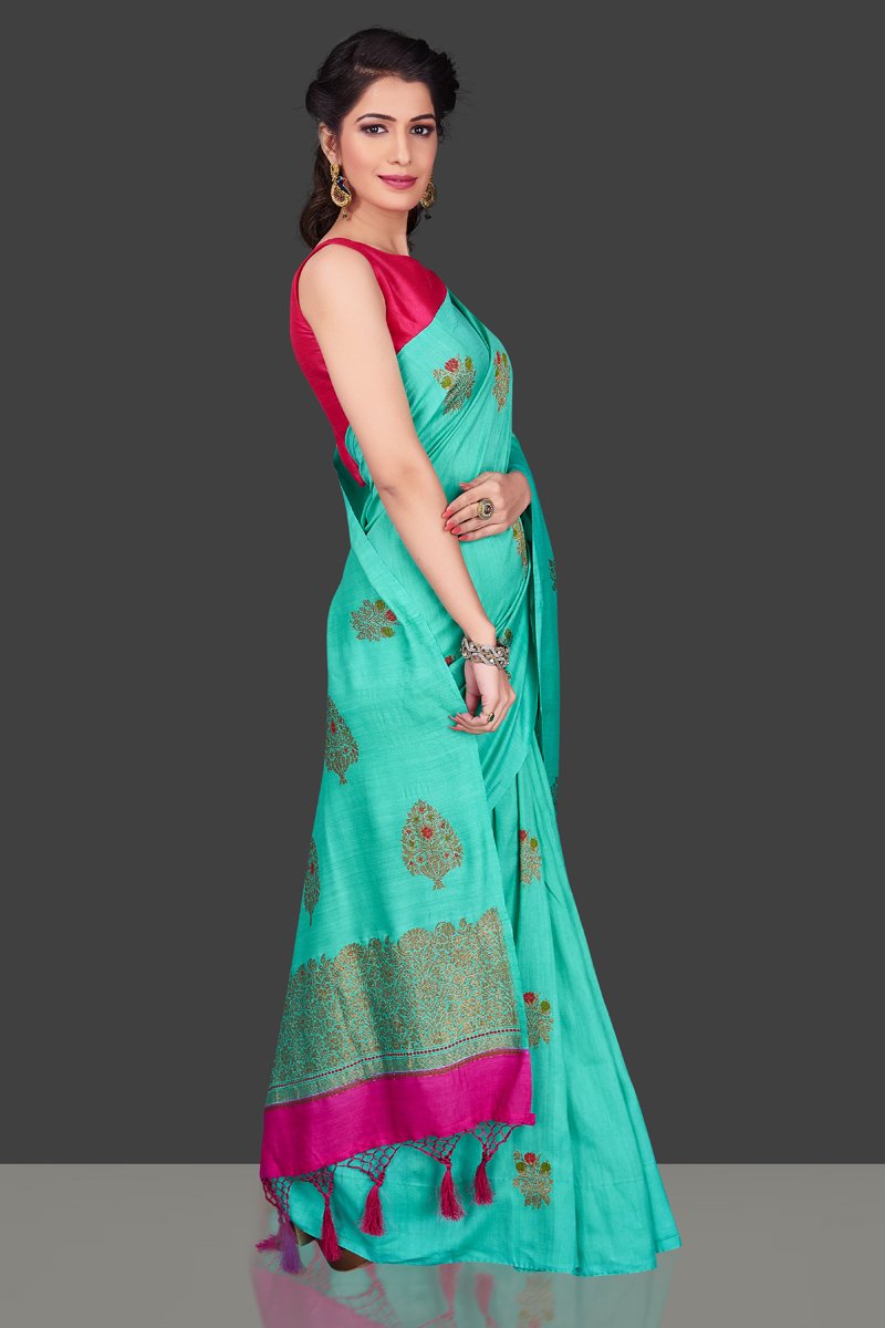 Buy stunning sea green muga Banarasi sari online in USA with zari buta. Shop beautiful Banarasi sarees, georgette sarees, pure muga silk sarees in USA from Pure Elegance Indian fashion boutique in USA. Get spoiled for choices with a splendid variety of Indian saris to choose from! Shop now.-side
