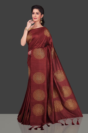 Buy elegant maroon borderless muga Benarasi saree online in USA with big antique zari buta. Shop beautiful Banarasi sarees, georgette sarees, pure muga silk sarees in USA from Pure Elegance Indian fashion boutique in USA. Get spoiled for choices with a splendid variety of Indian saris to choose from! Shop now.-front