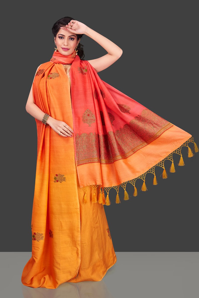 Shop stunning orange and yellow borderless muga Benarasi saree online in USA with antique zari buta. Shop beautiful Banarasi sarees, georgette sarees, pure muga silk sarees in USA from Pure Elegance Indian fashion boutique in USA. Get spoiled for choices with a splendid variety of Indian saris to choose from! Shop now.-full view