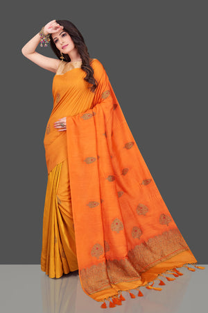 Buy charming orange and yellow borderless muga Benarasi sari online in USA with antique zari buta. Shop beautiful Banarasi sarees, georgette sarees, pure muga silk sarees in USA from Pure Elegance Indian fashion boutique in USA. Get spoiled for choices with a splendid variety of Indian saris to choose from! Shop now.-front