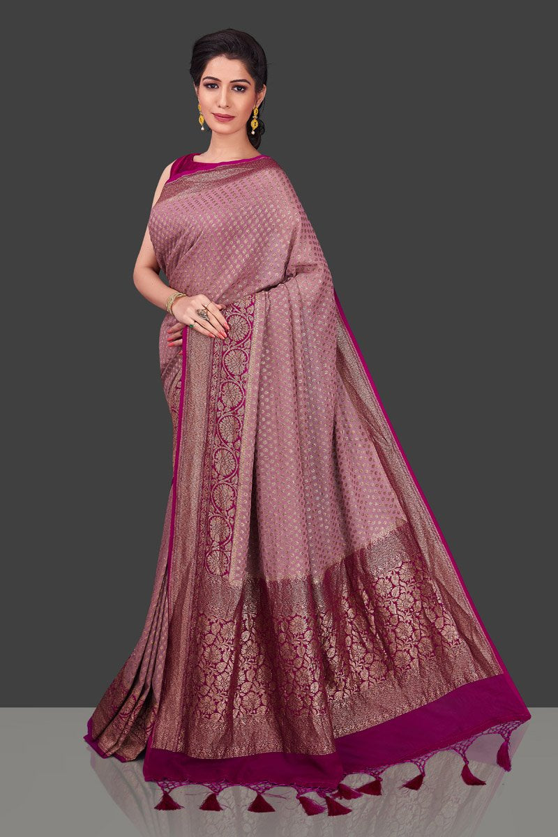 Buy gorgeous mauve color georgette Benarasi sari online in USA with magenta zari border. Shop beautiful Banarasi sarees, georgette sarees, pure muga silk sarees in USA from Pure Elegance Indian fashion boutique in USA. Get spoiled for choices with a splendid variety of Indian saris to choose from! Shop now.-full view