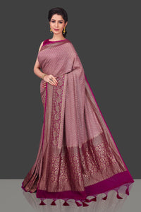 Buy gorgeous mauve color georgette Benarasi sari online in USA with magenta zari border. Shop beautiful Banarasi sarees, georgette sarees, pure muga silk sarees in USA from Pure Elegance Indian fashion boutique in USA. Get spoiled for choices with a splendid variety of Indian saris to choose from! Shop now.-full view