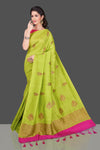 Shop pista green borderless muga Benarasi sari online in USA with zari buta. Shop beautiful Banarasi sarees, georgette sarees, pure muga silk sarees in USA from Pure Elegance Indian fashion boutique in USA. Get spoiled for choices with a splendid variety of Indian saris to choose from! Shop now.-full view