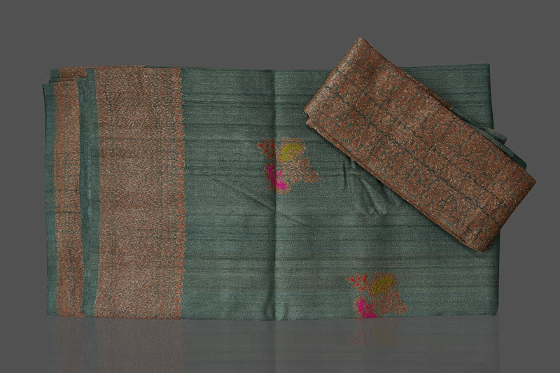 Shop elegant green tussar Banarasi sari online in USA with antique zari minakari buta. Shop beautiful Banarasi sarees, tussar sarees, pure muga silk sarees in USA from Pure Elegance Indian fashion boutique in USA. Get spoiled for choices with a splendid variety of Indian saris to choose from! Shop now.-details