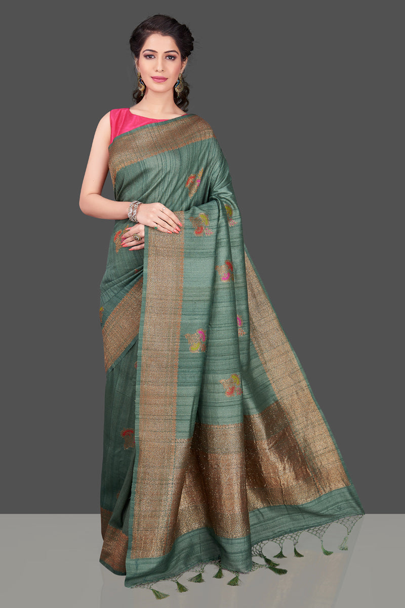 Shop elegant green tussar Banarasi sari online in USA with antique zari minakari buta. Shop beautiful Banarasi sarees, tussar sarees, pure muga silk sarees in USA from Pure Elegance Indian fashion boutique in USA. Get spoiled for choices with a splendid variety of Indian saris to choose from! Shop now.-front