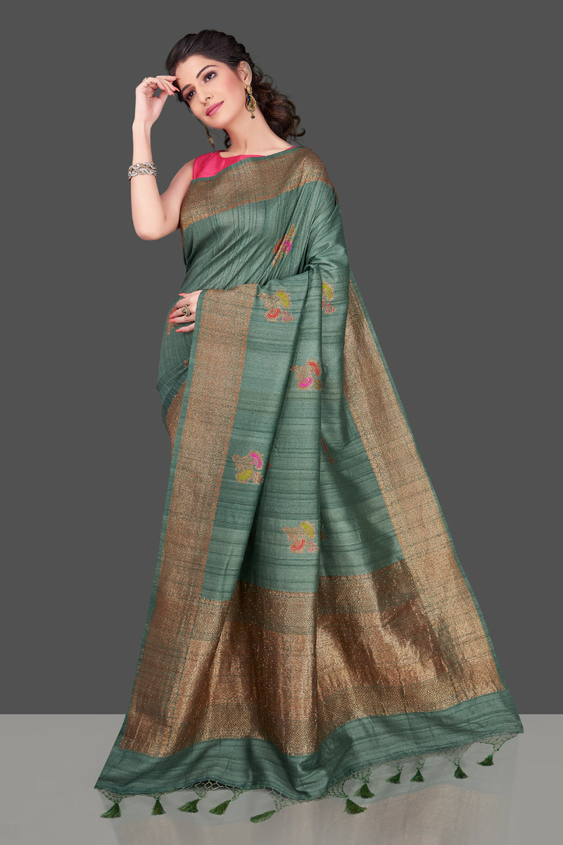 Shop elegant green tussar Banarasi sari online in USA with antique zari minakari buta. Shop beautiful Banarasi sarees, tussar sarees, pure muga silk sarees in USA from Pure Elegance Indian fashion boutique in USA. Get spoiled for choices with a splendid variety of Indian saris to choose from! Shop now.-full view