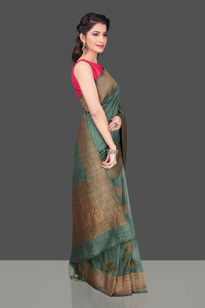 Shop elegant green tussar Banarasi sari online in USA with antique zari minakari buta. Shop beautiful Banarasi sarees, tussar sarees, pure muga silk sarees in USA from Pure Elegance Indian fashion boutique in USA. Get spoiled for choices with a splendid variety of Indian saris to choose from! Shop now.-side