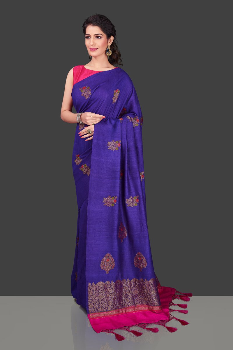 Buy gorgeous purple borderless muga Banarasi saree online in USA with floral bunch zari buta. Shop beautiful Banarasi sarees, georgette sarees, pure muga silk sarees in USA from Pure Elegance Indian fashion boutique in USA. Get spoiled for choices with a splendid variety of Indian saris to choose from! Shop now.-front