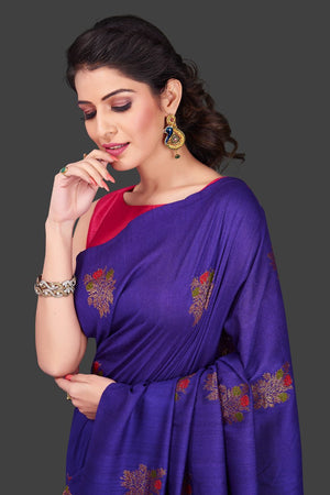 Buy gorgeous purple borderless muga Banarasi saree online in USA with floral bunch zari buta. Shop beautiful Banarasi sarees, georgette sarees, pure muga silk sarees in USA from Pure Elegance Indian fashion boutique in USA. Get spoiled for choices with a splendid variety of Indian saris to choose from! Shop now.-closeup