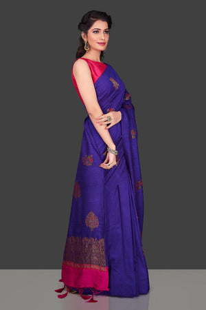 Buy gorgeous purple borderless muga Banarasi saree online in USA with floral bunch zari buta. Shop beautiful Banarasi sarees, georgette sarees, pure muga silk sarees in USA from Pure Elegance Indian fashion boutique in USA. Get spoiled for choices with a splendid variety of Indian saris to choose from! Shop now.-side