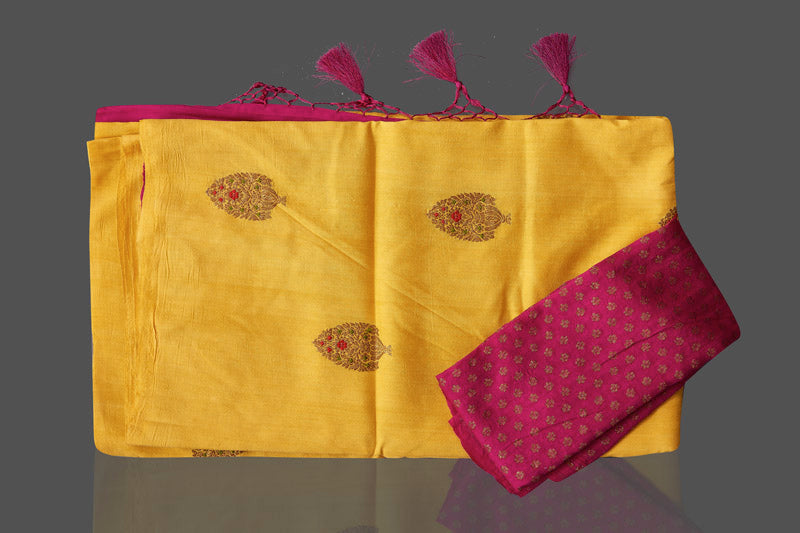 Buy gorgeous yellow borderless muga Banarasi saree online in USA with floral bunch zari buta. Shop beautiful Banarasi sarees, georgette sarees, pure muga silk sarees in USA from Pure Elegance Indian fashion boutique in USA. Get spoiled for choices with a splendid variety of Indian saris to choose from! Shop now.-details