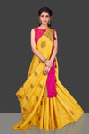 Buy bright yellow borderless muga Banarasi saree online in USA with zari buta. Shop beautiful Banarasi sarees, georgette sarees, pure muga silk sarees in USA from Pure Elegance Indian fashion boutique in USA. Get spoiled for choices with a splendid variety of Indian saris to choose from! Shop now.-full view