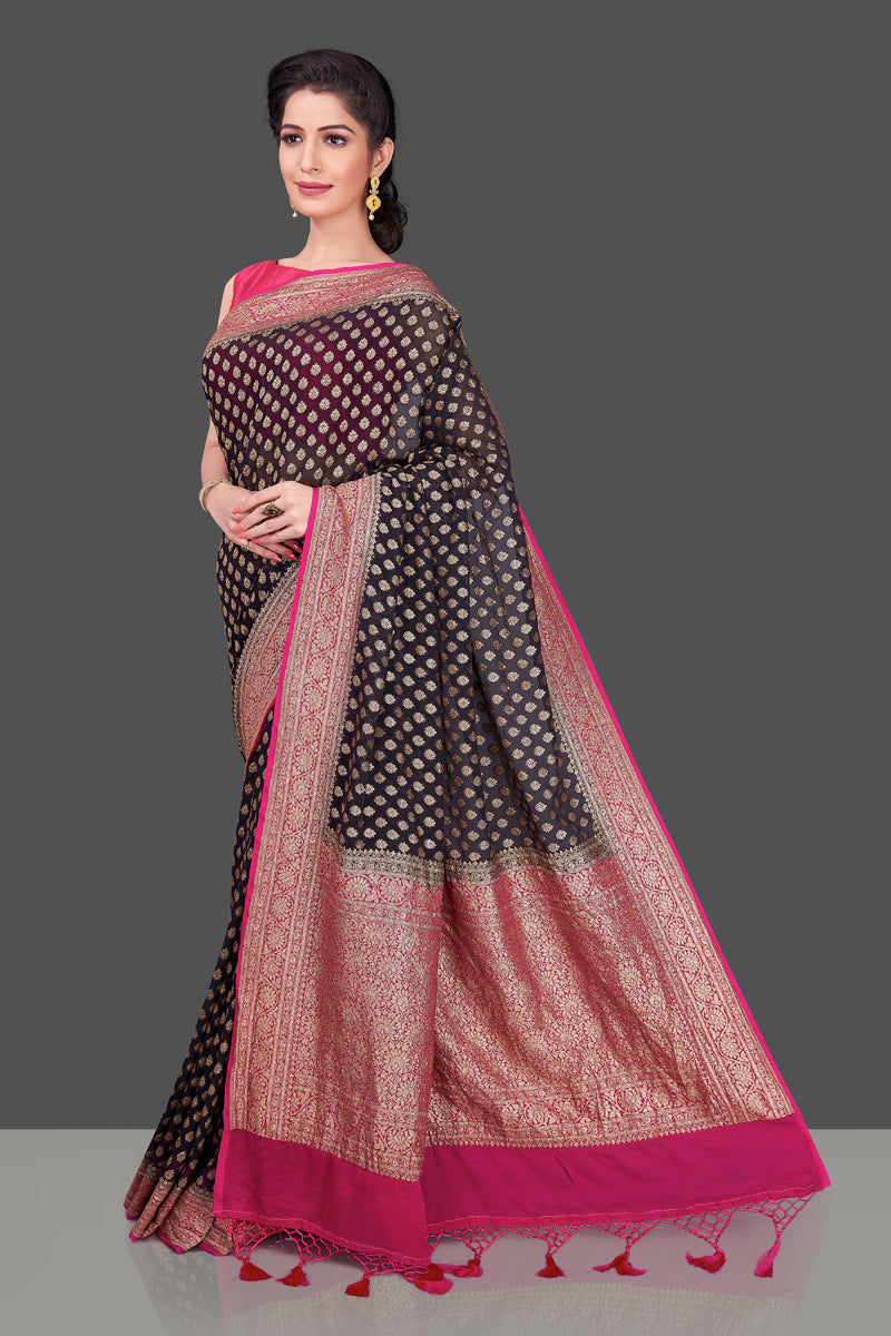 Shop beautiful black georgette Banarasi saree online in USA with pink zari border. Shop beautiful Banarasi sarees, georgette sarees, pure muga silk sarees in USA from Pure Elegance Indian fashion boutique in USA. Get spoiled for choices with a splendid variety of Indian saris to choose from! Shop now.-full view