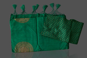 Buy bottle green borderless muga Banarasi sari online in USA with big antique zari buta. Shop beautiful Banarasi sarees, georgette sarees, pure muga silk sarees in USA from Pure Elegance Indian fashion boutique in USA. Get spoiled for choices with a splendid variety of Indian saris to choose from! Shop now.-details