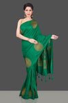 Buy bottle green borderless muga Banarasi sari online in USA with big antique zari buta. Shop beautiful Banarasi sarees, georgette sarees, pure muga silk sarees in USA from Pure Elegance Indian fashion boutique in USA. Get spoiled for choices with a splendid variety of Indian saris to choose from! Shop now.-full view