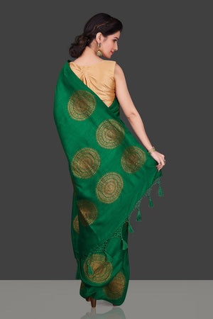 Buy bottle green borderless muga Banarasi sari online in USA with big antique zari buta. Shop beautiful Banarasi sarees, georgette sarees, pure muga silk sarees in USA from Pure Elegance Indian fashion boutique in USA. Get spoiled for choices with a splendid variety of Indian saris to choose from! Shop now.-back