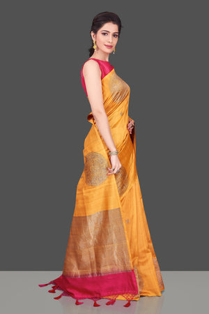 Buy online yellow borderless Banarasi muga saree in USA with big zari buta. Shop beautiful Banarasi sarees, georgette sarees, pure muga silk sarees in USA from Pure Elegance Indian fashion boutique in USA. Get spoiled for choices with a splendid variety of designer saris to choose from! Shop now.-side