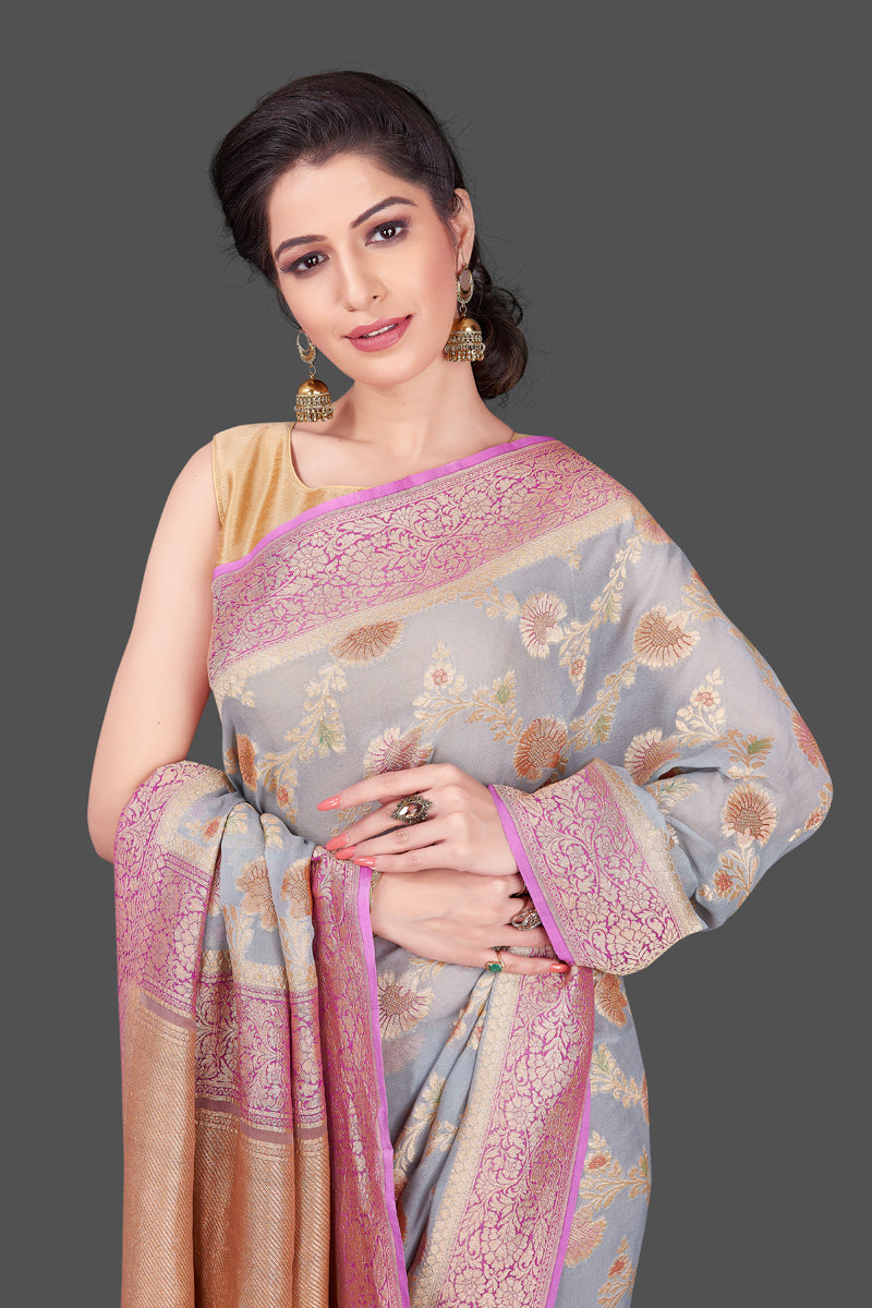 Shop beautiful light grey georgette Banarasi saree online in USA with floral zari jaal. Shop beautiful Banarasi georgette sarees, tussar sarees, pure muga silk sarees in USA from Pure Elegance Indian fashion boutique in USA. Get spoiled for choices with a splendid variety of Indian saris to choose from! Shop now.-closeup