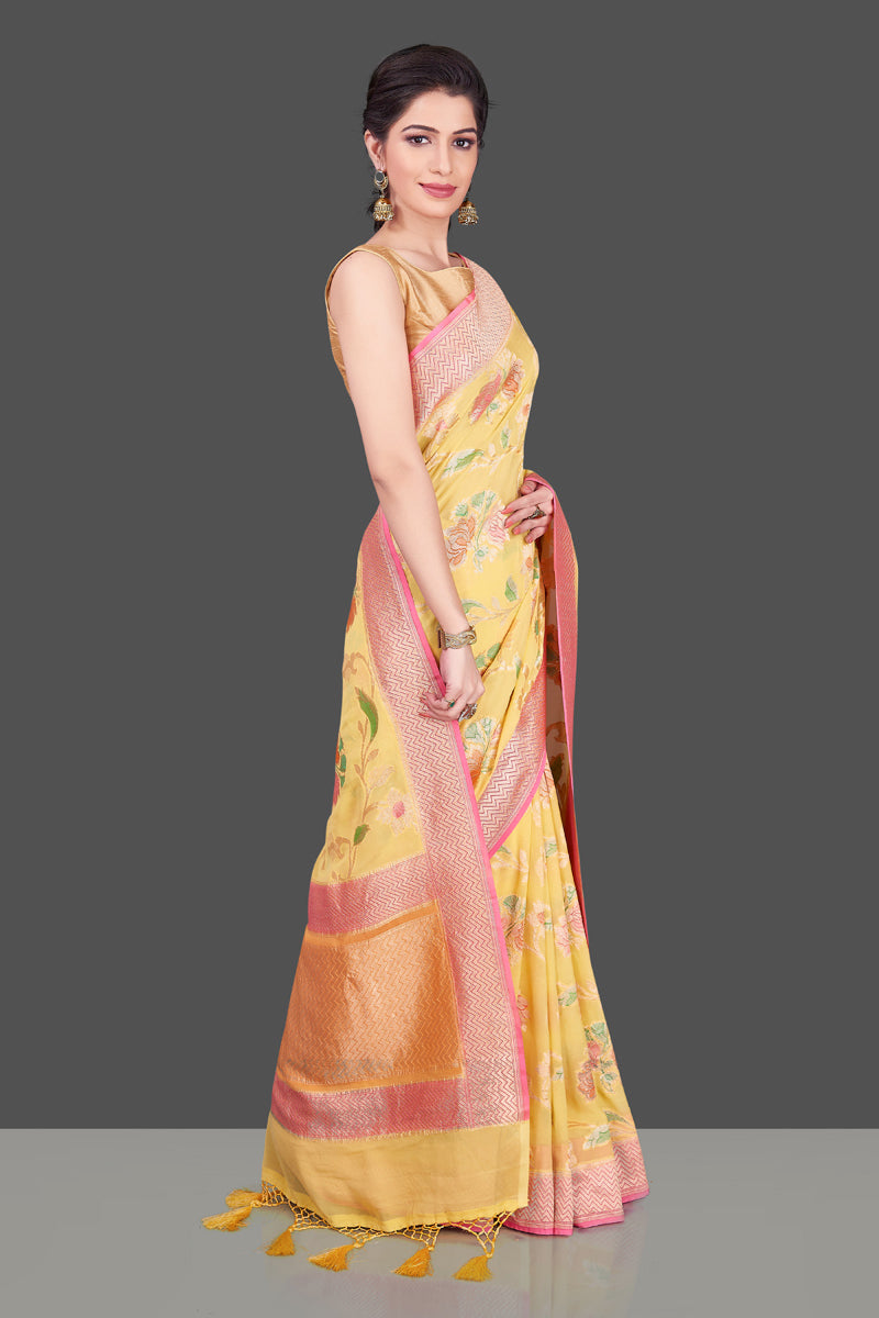 Buy stunning yellow georgette Banarasi sari online in USA with floral zari jaal. Shop beautiful Banarasi georgette sarees, tussar sarees, pure muga silk sarees in USA from Pure Elegance Indian fashion boutique in USA. Get spoiled for choices with a splendid variety of Indian saris to choose from! Shop now.-side