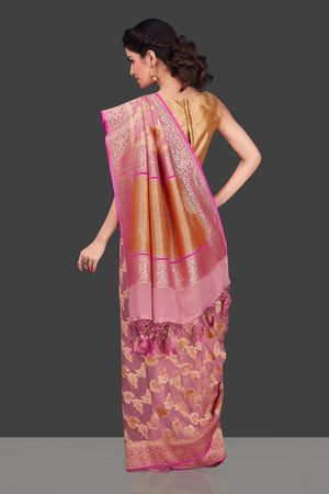 Buy gorgeous dusty pink georgette Benarasi sari online in USA with floral zari jaal. Shop beautiful Banarasi georgette sarees, tussar sarees, pure muga silk sarees in USA from Pure Elegance Indian fashion boutique in USA. Get spoiled for choices with a splendid variety of Indian saris to choose from! Shop now.-back