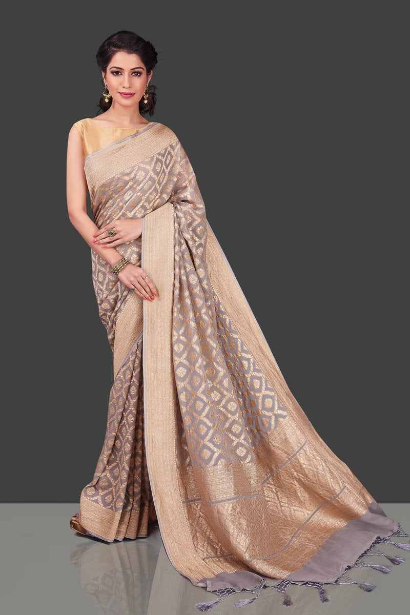 Shop beautiful light grey Banarasi georgette sari online in USA with zari work. Shop beautiful Banarasi georgette sarees, tussar saris, pure muga silk saris in USA from Pure Elegance Indian fashion boutique in USA. Get spoiled for choices with a splendid variety of Indian sarees to choose from! Shop now.-front