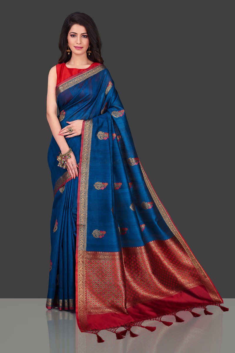 Shop dark blue Banarasi tassar saree in USA with floral zari buta. Shop beautiful Banarasi georgette sarees, tussar saris, pure muga silk saris in USA from Pure Elegance Indian fashion boutique in USA. Get spoiled for choices with a splendid variety of Indian sarees to choose from! Shop now.-full view